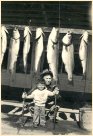 Jack (John Francis) Ford with his grandson Mike Ford outside Ford's restaurant, Canyonville, Oregon, c. 1948