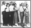 'Common Sense' Ross, Albertine Pickens, Jelly Roll Morton, Ada 'Bricktop' Smith, Eddie Rucker and Mabel Watts outside the Cadillac Cafe, Los Angeles, c. September / October 1917